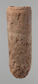Vessel, Egyptian pottery vessel, handmade clay vessel. An almost cylindrical vessel, widest in its