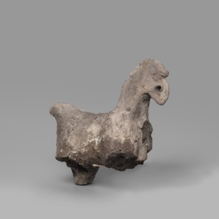 Horse figurine. Schematic representation of a horse with a short torso, a massive arched neck and a