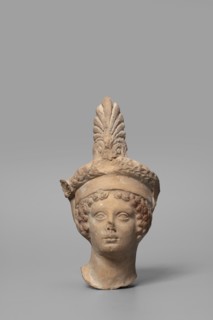 Head of a Dionysus figurine; maker, Tarentine workshop; Dionysus mythology, wreaths; Greek deity;