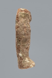 Ushabti. Mummy-shaped ushabti figurine made of clay, impressed in a mold. Traces of white primer