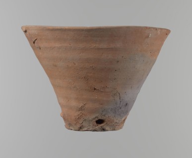 Bowl. Vessel flower pot with a conical shape and a flat bottom. Irregular walls. Straight, flat,
