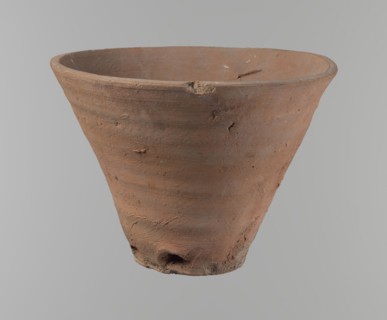 Bowl. Vessel flower pot with a conical shape and a flat bottom. Irregular walls. Straight, flat,
