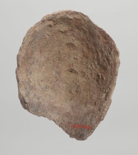 Female votive head, Female head with long, straight hair falling to the shoulders. Neck partially