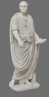 Roman statue, unknown Roman workshop. The figure of a standing man dressed in a tunic and toga,