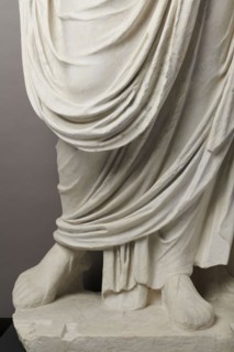 Roman statue, unknown Roman workshop. The figure of a standing man dressed in a tunic and toga,