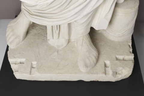 Roman statue, unknown Roman workshop. The figure of a standing man dressed in a tunic and toga,