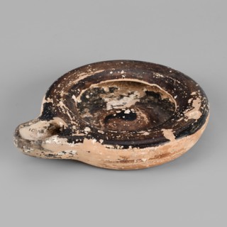 Oil lamp, Tekieli, St. - deposit, Reddish, fine-grained clay. Low lamp with broad arms slightly