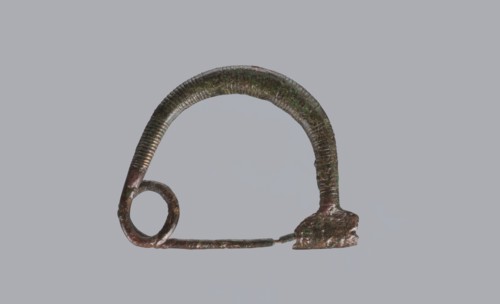 Arched fibula, one-piece ad arco semplice fibula with an arched bow made of a round bronze bar,