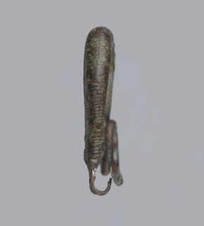 Arched fibula, one-piece fibula with an arched bow made of a round bar, decorated with groups of
