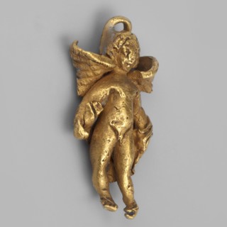 Eros-shaped pendant, Pendant in the shape of a standing Cupid Eros with simplified hands and