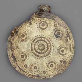 Bulla – medallion, Round bulla decorated with concentrically arranged repoussé points. Gold,