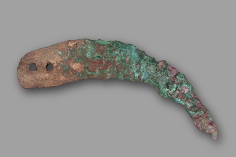 Sickle blade, unknown Northern Mesopotamian workshop. The sickle blade is arched, tipped with a