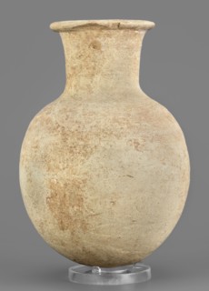 Flask, unknown Northern Mesopotamian workshop; clay flask-shaped vessel with an elongated ovoid