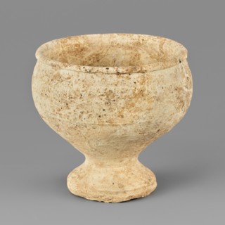 Footed bowl, unknown Northern Mesopotamian workshop. Miniature bowl on a low, conically formed