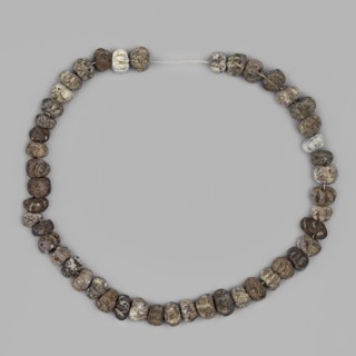 Necklace, unknown Northern Mesopotamian workshop; jewellery of frit beads; composed of forty-eight