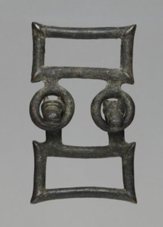 Buckle, bronze; two-part rectangular form with joints; one part with hooks shaped as zoomorphic
