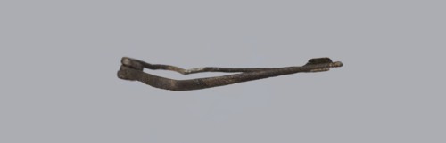 Fibula, Bronze Etruscan fibula with a bent ring made of flatly beaten wire, passing in a three-turn