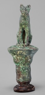 Cat sitting on a papyrus column;, Egyptian art, Late Period, 664–332 BC. Bronze figurine. Height 11