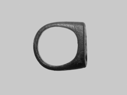 Ring, Ring with a band and a stone, cast from a single piece of metal. The band is narrow, convex