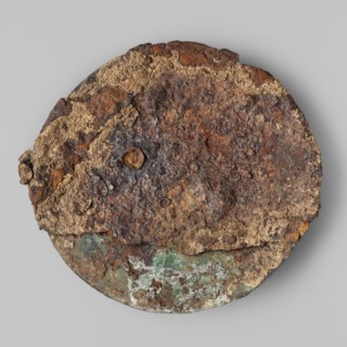 Cardiophilax – breastplate, Convex bronze disc decorated with an engraving of three concentric
