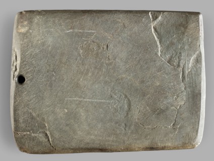 Rectangular paddle with a hole at one of the shorter edges; possibly a whetstone. Flat rectangular