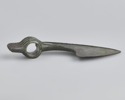 Battle axe, unknown Luristan workshop. Battle axe with a low cylindrical socket with a round hole,