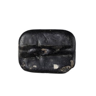 Rectangular stamp seal with a handle in the form of a protruding ridge along the axis of the seal