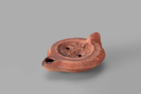 Lamp decorated with a representation of the goddess Roma: single-burner oil lamp depicting Roma