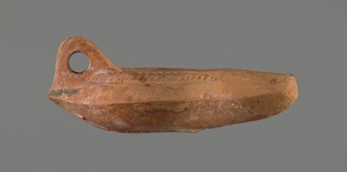 Oil lamp, 5th century, Carthage; oil lamp; height 5.3 cm, width 8.7 cm, depth 13.6 cm, A weathered