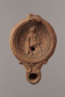 Lamp decorated with a depiction of a gladiator so-called Samnite, unknown Roman workshop,