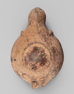 Lamp decorated with a depiction of a gladiator so-called Samnite, unknown Roman workshop, Scen.Gal