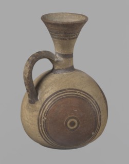 Cypriot jug, Jug on a low, straight foot. Globular body, flattened at the bottom. Quite narrow