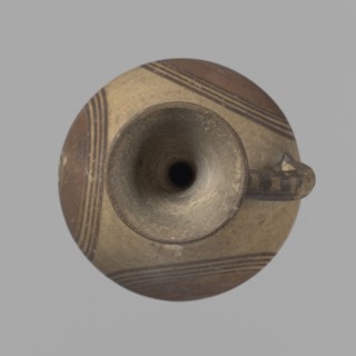 Cypriot jug. Jug on a low, straight foot. Globular body, flattened at the bottom. Quite narrow