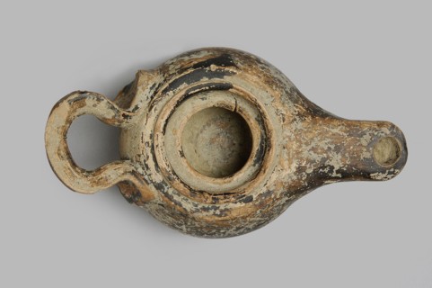 Oil lamp, unknown Attic workshop. Wheel-made lamp with a globular, slightly squat container.