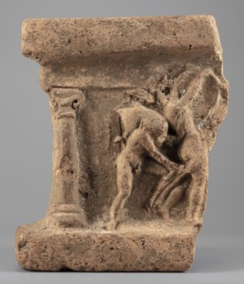 Fragment of an arula home altar depicting a satyr with a wineskin and a maenad with a drum;, Satyr