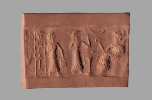 Cylinder seal with a presentation scene and a cuneiform inscription, unknown Akkadian workshop;