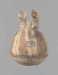 Jug, unknown Cypriot workshop. White painted ware jug with a spherical bottom, a bulging