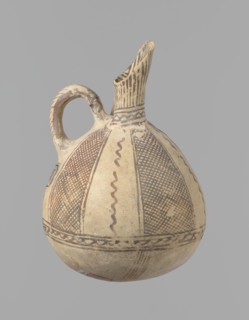 Jug, unknown Cypriot workshop. White painted ware jug with a spherical bottom, a bulging