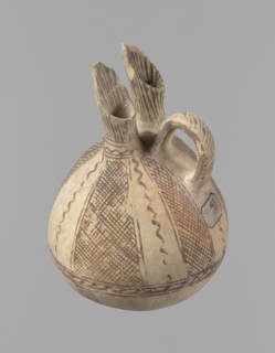 Jug, unknown Cypriot workshop. White painted ware jug with a spherical bottom and bulging,