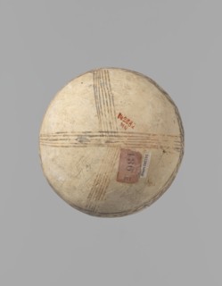 Jug, unknown Cypriot workshop. White painted ware jug with a spherical bottom, a bulging