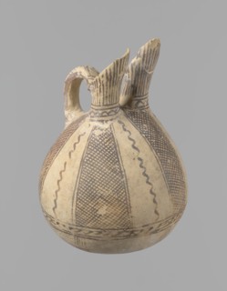 Jug, unknown Cypriot workshop. White painted ware jug with a spherical bottom, a bulging