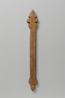 Hand cross, Ethiopian workshop. A small, roughly detailed hand cross with a rhomboid ending—shaped