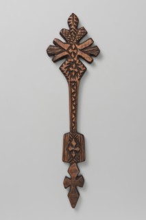 Hand cross, Ethiopian workshop. Hand cross with the upper part inscribed in a rhombus mounted on a