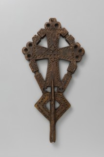 Processional cross, Ethiopian workshop. A small, likely processional isosceles cross with slightly