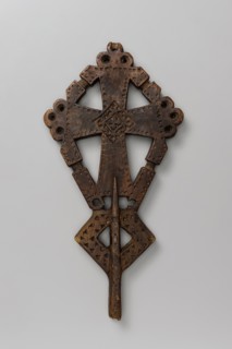 Processional cross, Ethiopian workshop. A small isosceles processional cross with slightly widening