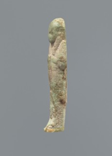 Ushabti, Mummy-shaped figurine, funerary gift, hoes. Hands folded on the chest, uncrossed, right