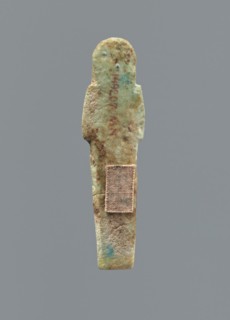Ushabti, Mummy-shaped figurine, funerary gift, funerary hoe. Hands folded on the chest, uncrossed,