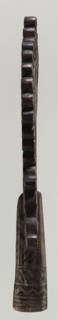 Processional cross, Ethiopian workshop. Pear-shaped frame depicts Christ on the cross with John and