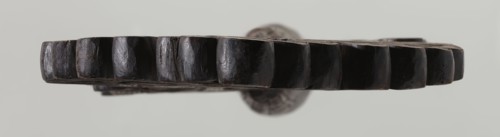 Processional cross, Ethiopian workshop. The pear-shaped frame depicts Christ on the cross with John