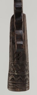 Processional cross, Ethiopian workshop. The pear-shaped frame depicts Christ on the cross with John
